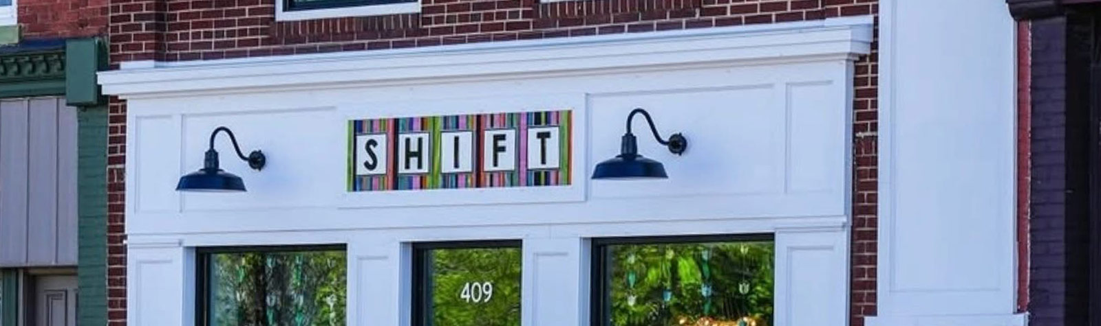 SHIFT Fenton storefront in a historic brick building
